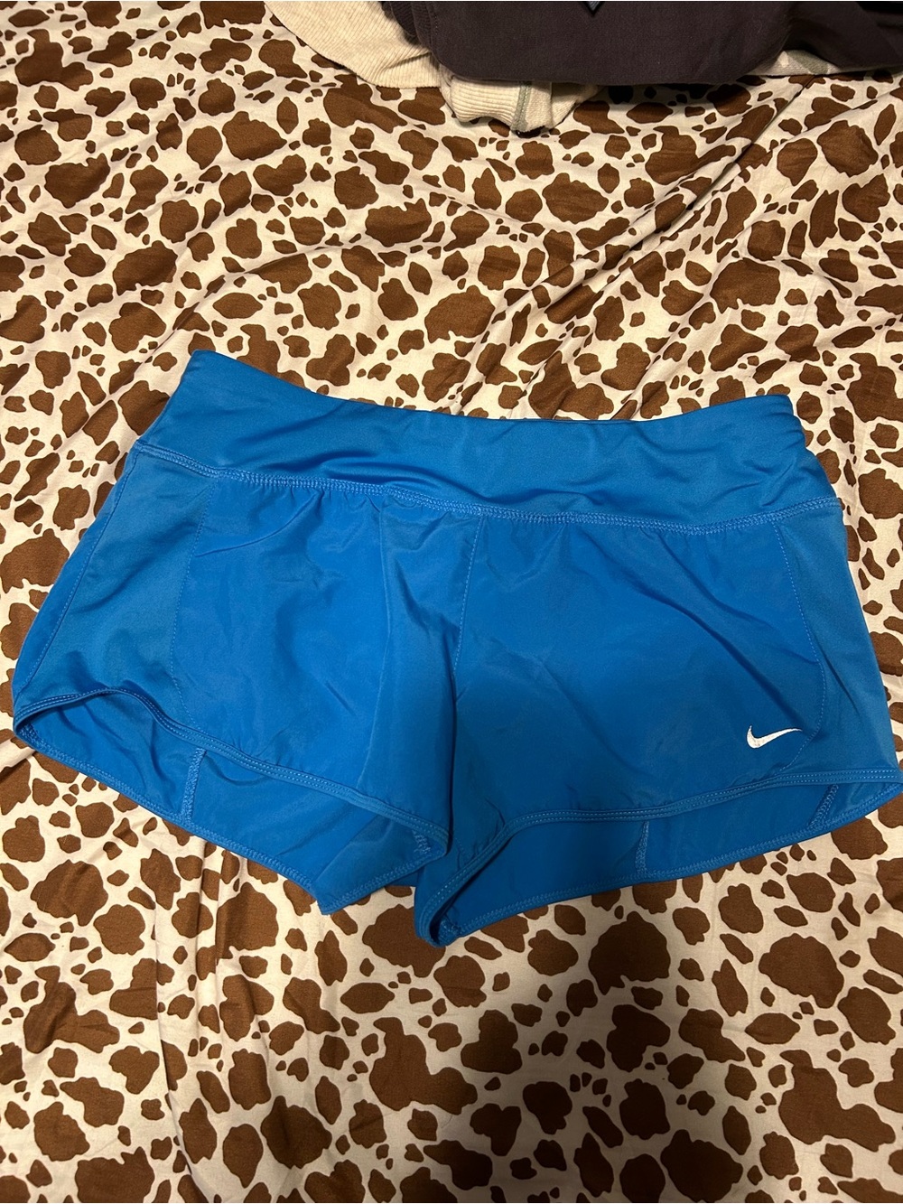 Nike Women’s Bright Blue Athletic Shorts with White Swoosh
